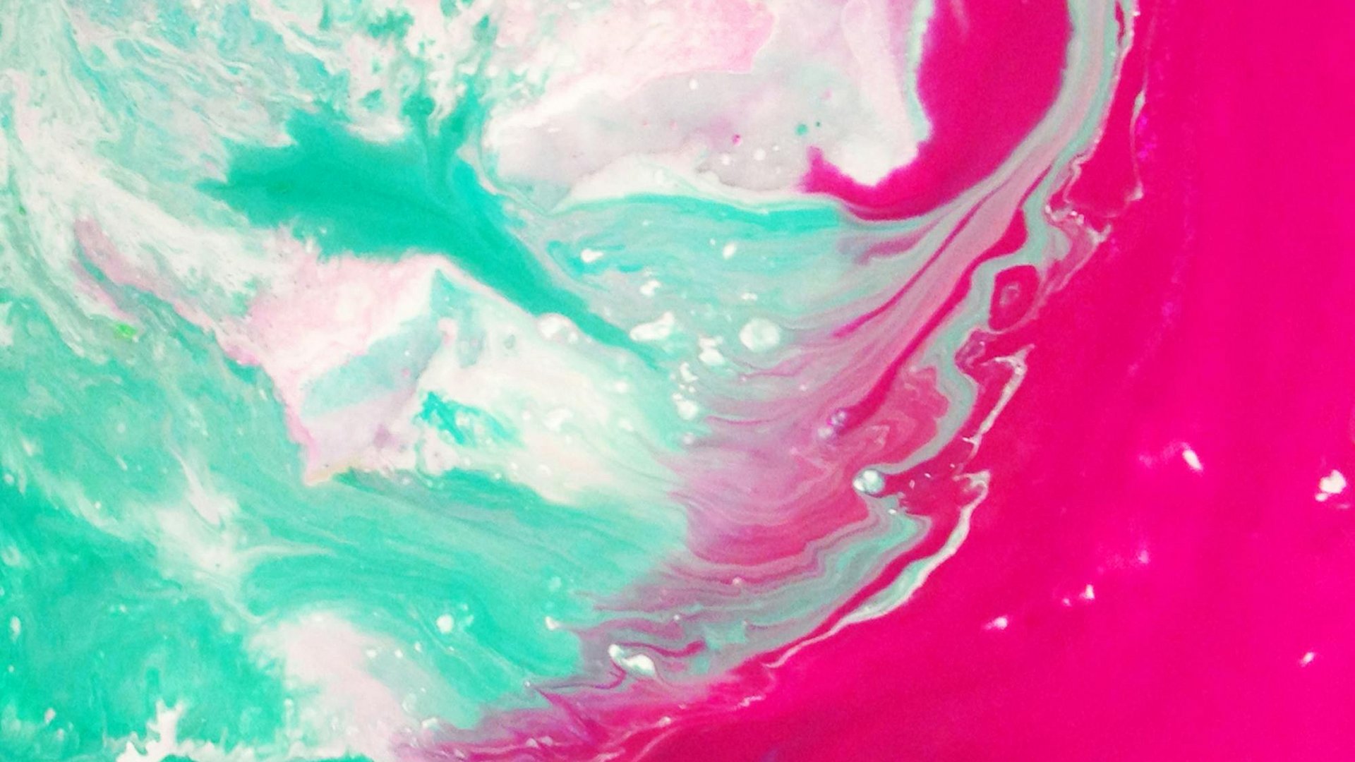 Abstract mix of green, pink and white with flowing patterns.