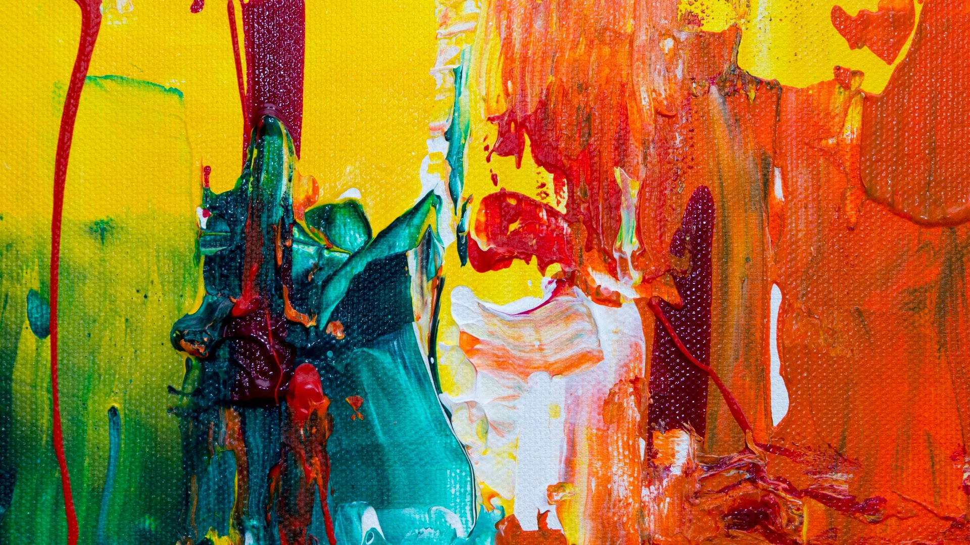 Colorful abstract art with dominant shades of yellow, red and blue.