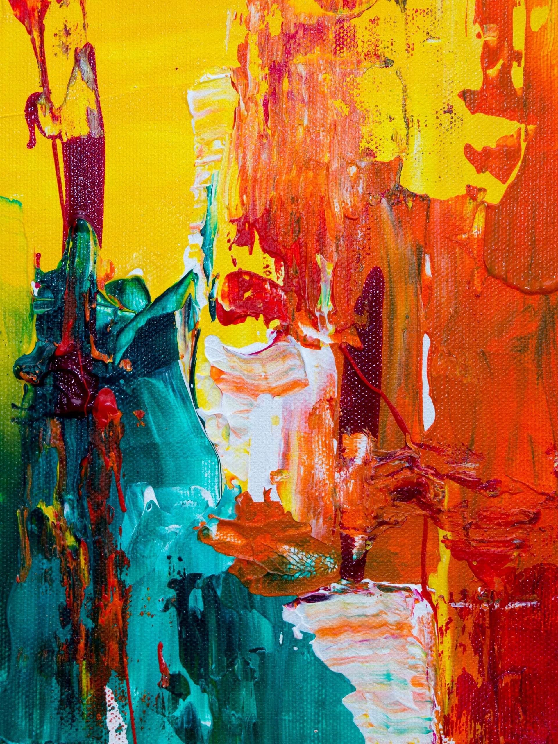 Colorful abstract art with dominant shades of yellow, red and blue.